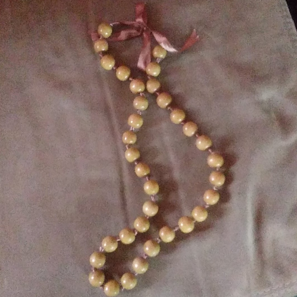 Necklace. Large beads with tie closure.